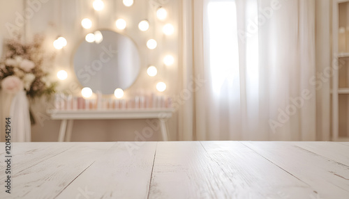 Defocused makeup mirror in dressing room with wooden table top photo