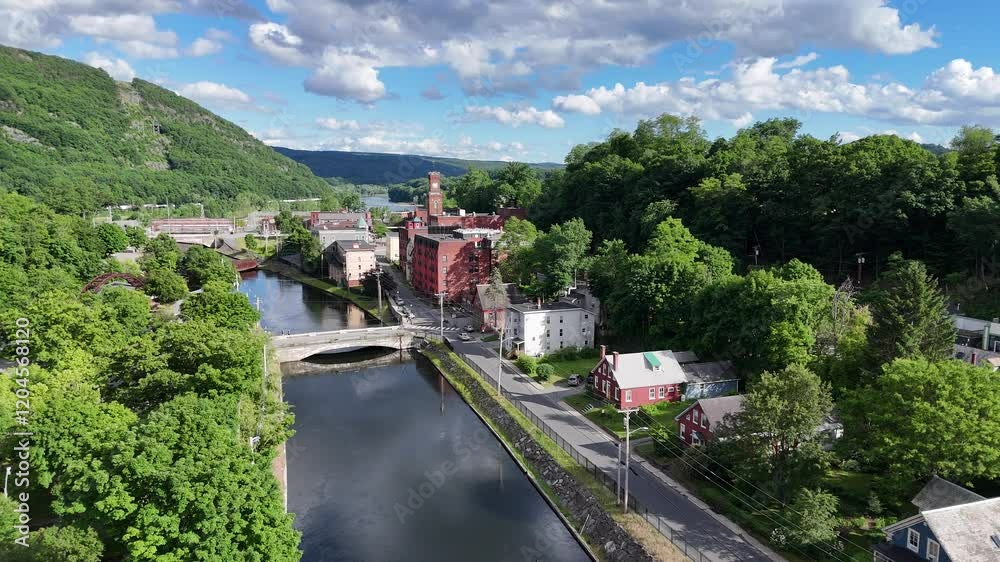 Bellows Falls, VT stock drone video of the small downtown area in the incorporated village located in Rockingham, Vermont on a summer day Bellows Falls, VT stock drone video of the small downtown area in the incorporated village located in Rockingham, Vermont on a summer day
