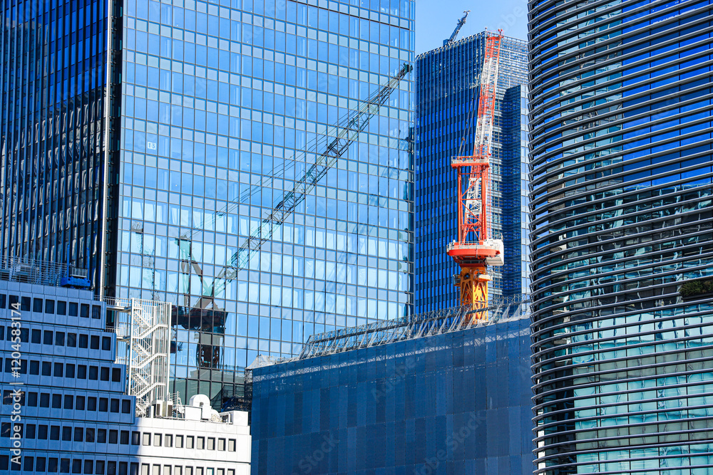 Fototapeta premium 建設中の高層ビルと都市開発の風景 開発イメージ