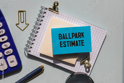 Business concept. open notepad with text on calendar - BALLPARK ESTIMATE