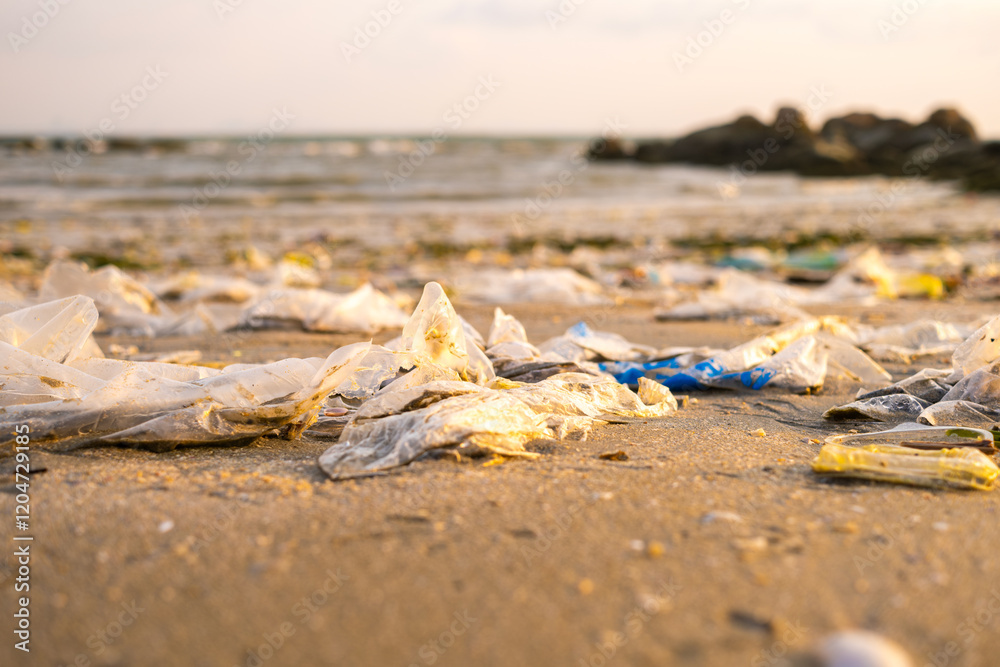 Top view trash, plastic cups and plastic bags at the beach. environmental problem concept and healing the world Top view trash, plastic cups and plastic bags at the beach. environmental problem concept and healing the world