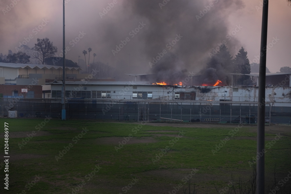 Obraz premium Buildings burning in the palisades fire