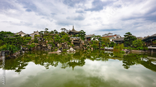 Reflections in the lake, Zhu family garden, old traditional chinese house in Jianshui china