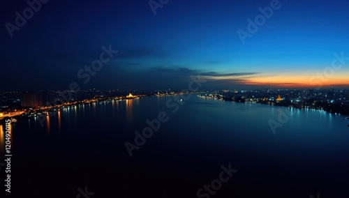 Wallpaper Mural Night Cityscape: Illuminated River and Skyline at Sunset Torontodigital.ca