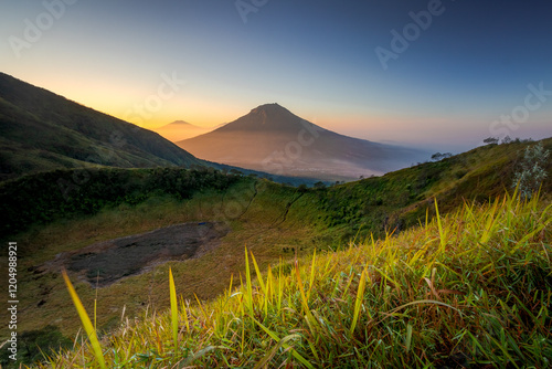 sunrise in dieng mountain indonesia photo