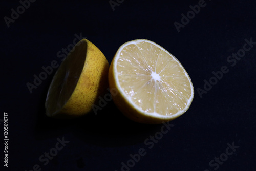 Photo of very fresh lemon slices, this fruit tastes sweet and sour, can be made into a fresh drink