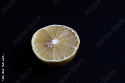 Photo of very fresh lemon slices, this fruit tastes sweet and sour, can be made into a fresh drink