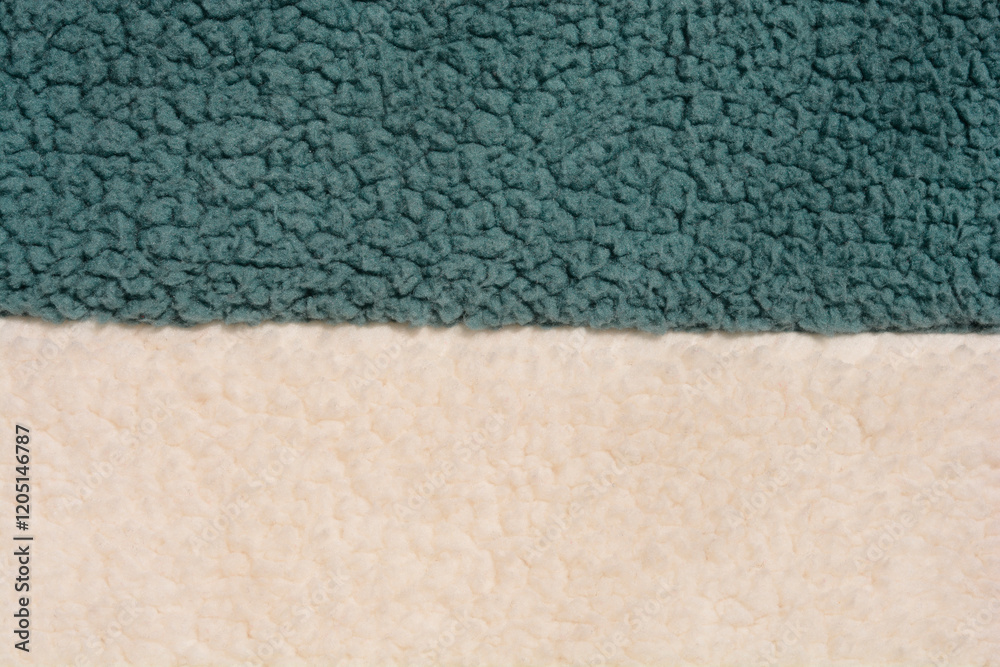 Fototapeta premium A close-up of the texture of green and white fleece fabric
