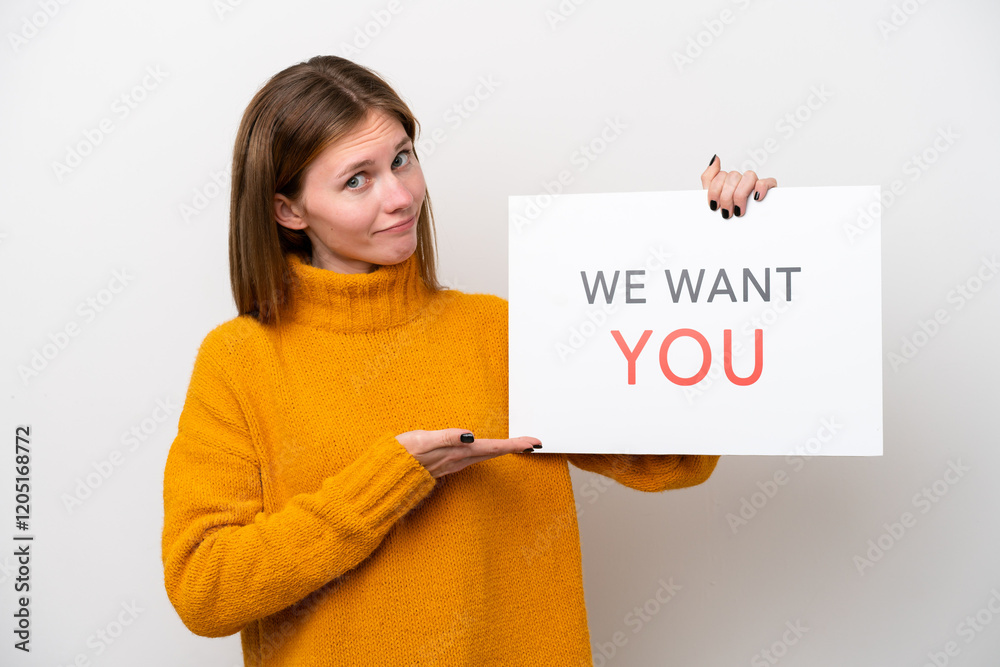 Young English woman isolated on white background holding We Want You board and pointing it Young English woman isolated on white background holding We Want You board and pointing it