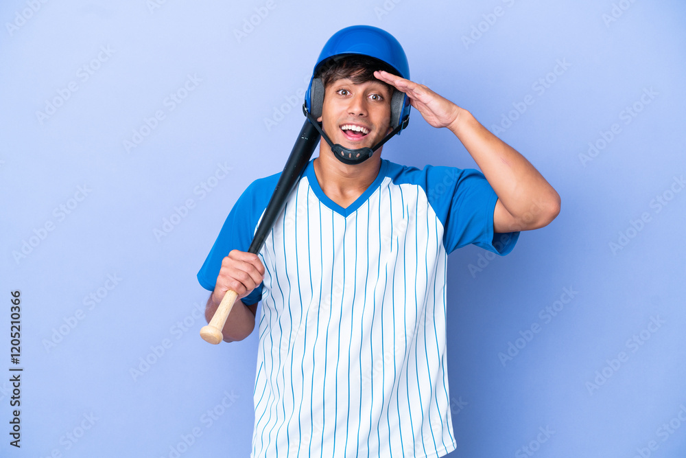 Baseball caucasian man player with helmet and bat isolated on blue background with surprise expression Baseball caucasian man player with helmet and bat isolated on blue background with surprise expression