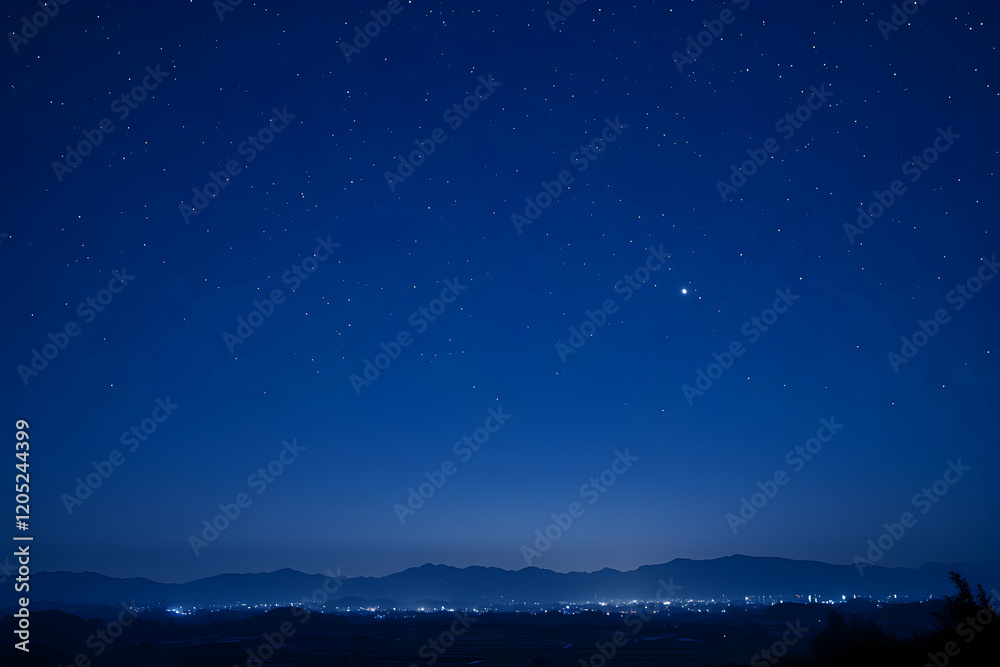 Fototapeta premium Night Sky over Distant City Lights and Mountains