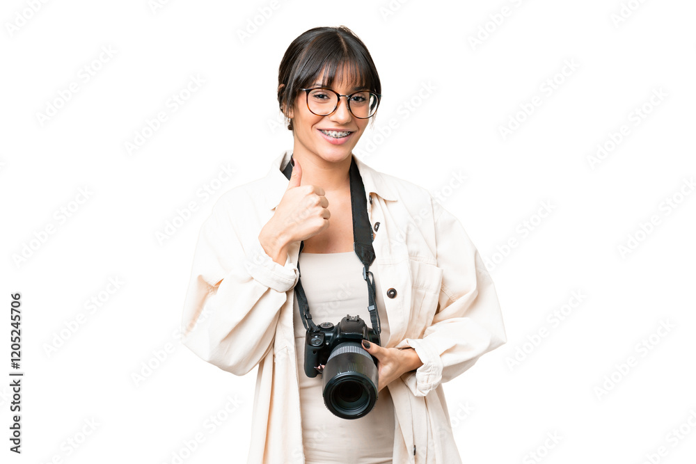 Young photographer caucasian woman over isolated chroma key background giving a thumbs up gesture Young photographer caucasian woman over isolated chroma key background giving a thumbs up gesture
