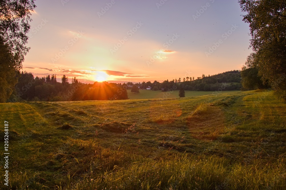 A beautiful sunset with colorful sky in the mountains at Sumava national park, Czech republic