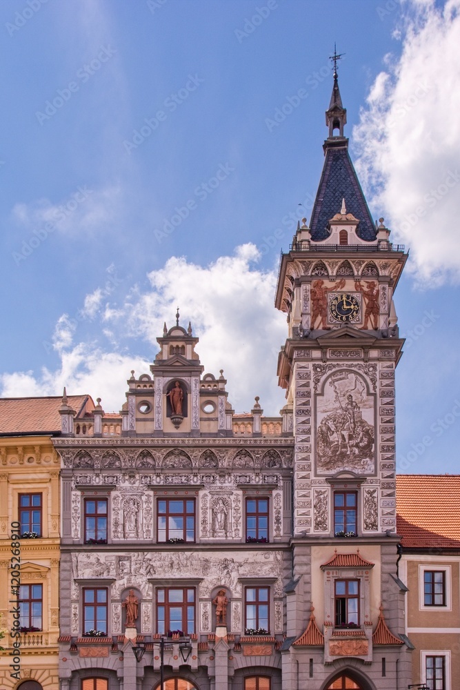 The decorated building of the New town hall with tower at historical city Prachatice, Czech republic