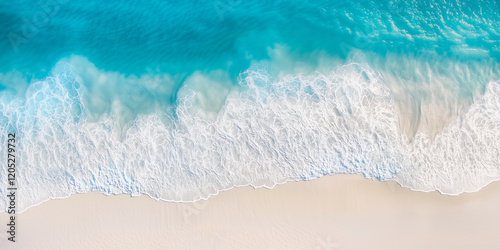 Fototapeta Naklejka Na Ścianę i Meble -  Sea background top view. Waves. Golden sandy shore. Ocean coastline. Blue lagoon. Deserted beach. Clear water surface.