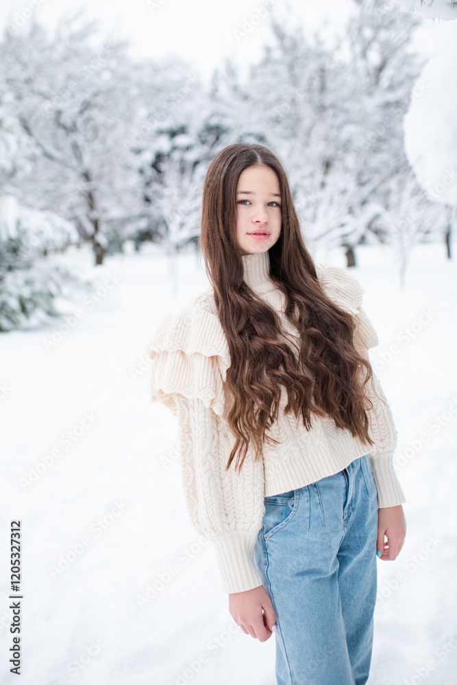 Pretty teenage girl 14-15 year old with long blonde hair wearing casual clothes over snow outdoors. Winter time. Pretty teenage girl 14-15 year old with long blonde hair wearing casual clothes over snow outdoors. Winter time.