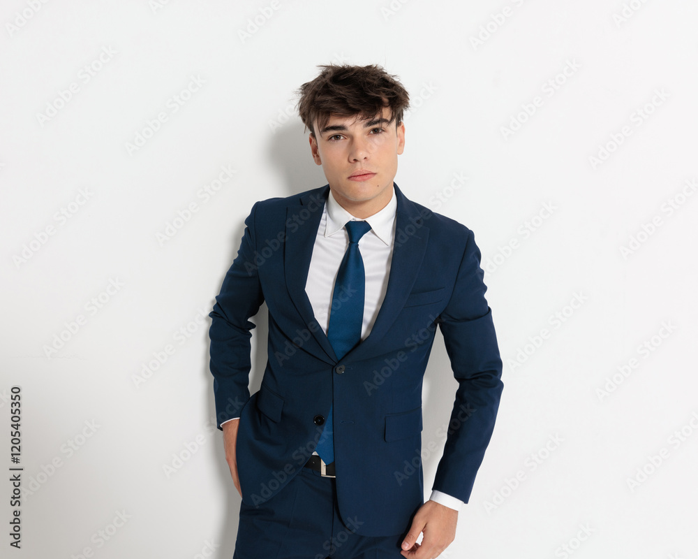 closeup of businessman pulling something out of pocket closeup of businessman pulling something out of pocket
