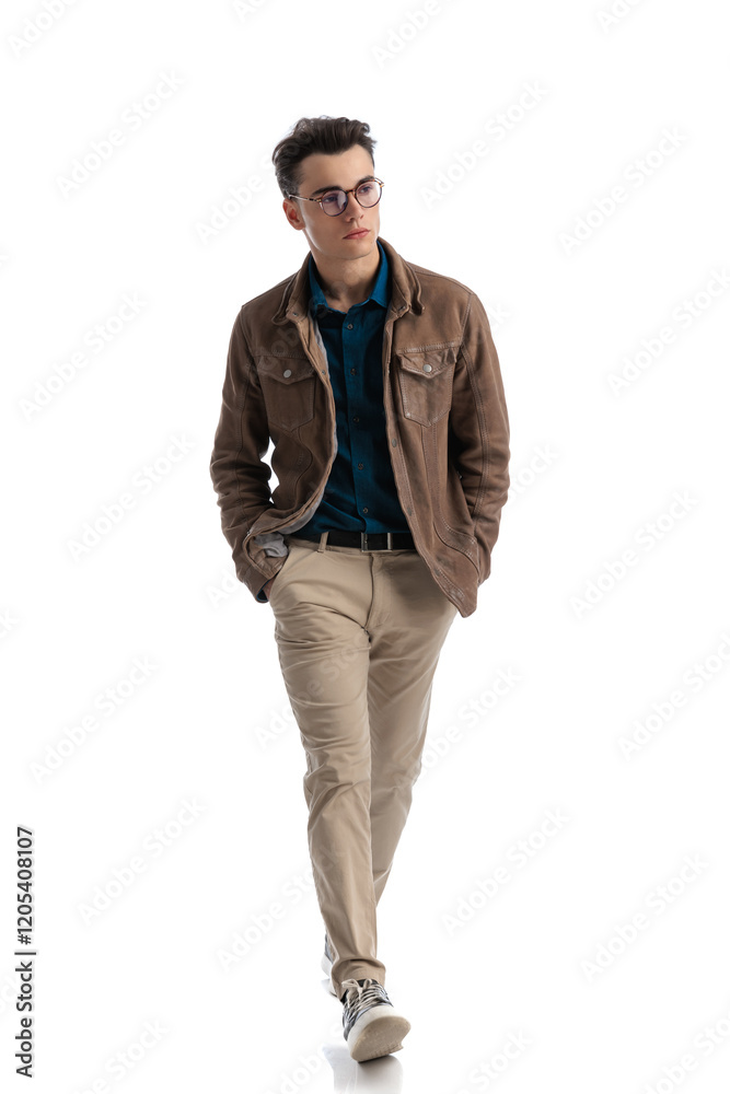 relaxed student wearing leather jacket and eyeglasses walking relaxed student wearing leather jacket and eyeglasses walking