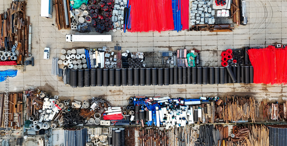 Fototapeta premium Warehouse of pipes and wells, top view