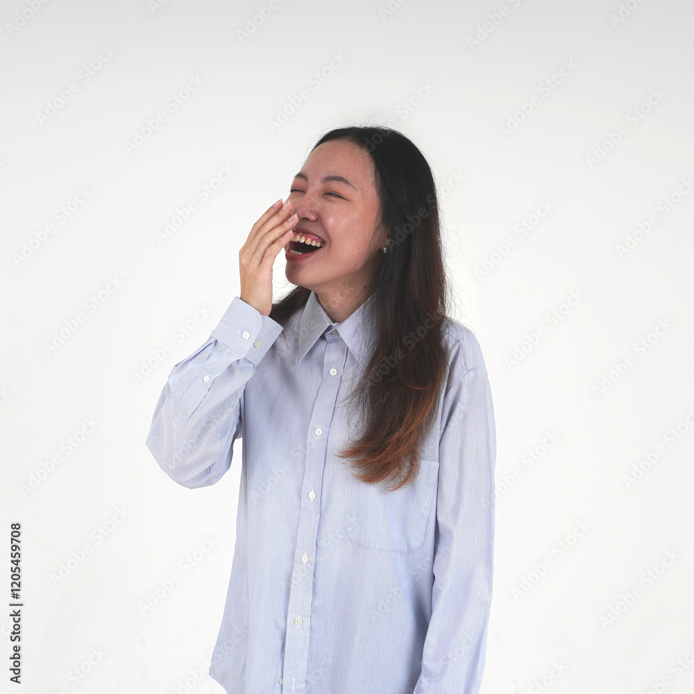 Cheerful asian women wearing light blue shirt and long hair laughing with hand in front of mouth gesture isolated on white background. Cheerful asian women wearing light blue shirt and long hair laughing with hand in front of mouth gesture isolated on white background.