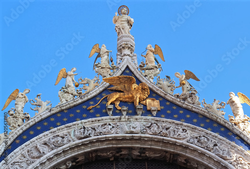 Sculptures on the facade of basilica di san marco or st. marks church in Venice Italy