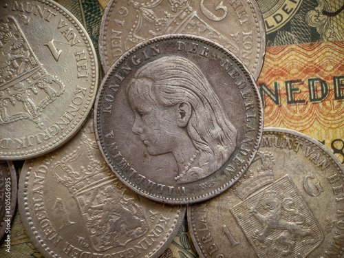 ancient dutch coin one guilder queen wilhelmina long hair. photo