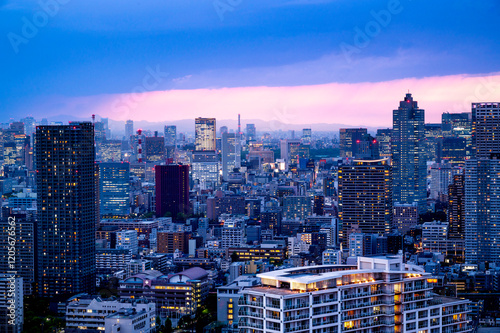 Obraz na płótnie Nightlight Cityscape of Tokyo, city aerial skyscraper view of office building and downtown and street of minato in tokyo with twilight sky background. Japan, Asia w salonie