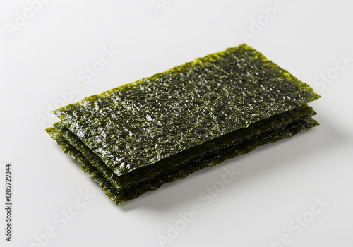 Roasted seaweed sheets on white background, studio shot, food photography