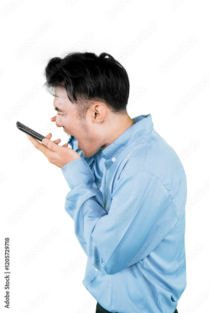 Angry Man Yelling at Smartphone in Frustration Angry Man Yelling at Smartphone in Frustration