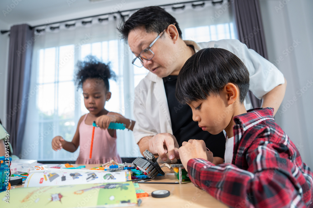 Multi ethnic Children engrossed in building and testing small robots with Teacher, showcasing curiosity, teamwork, and early STEM education. The focus robot and children hands-on engagement. Multi ethnic Children engrossed in building and testing small robots with Teacher, showcasing curiosity, teamwork, and early STEM education. The focus robot and children hands-on engagement.