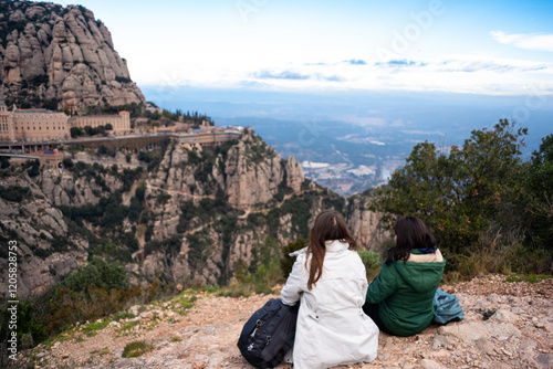 Two women sit down to rest after having toured the mountains of Montserrat. photo