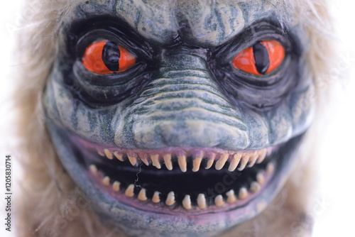 A detailed view of a frightening mask, great for horror-themed projects or Halloween decorations.
