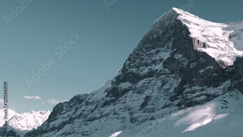 Beautiful Snowcapped Mountain Peak Eiger North Face at 3970 Meter High in a Sunny Winter Day in Grindelwald, Kleine Scheidegg, Bernese Oberland, Canton Bern, Switzerland.