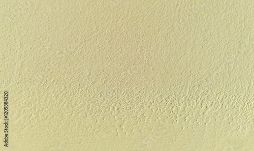 Beige or light-brown wall, texture, background. The building wall, painted with water-based paint. Pale (flat) surface in pearl color. Beige, worn, rough backdrop. Beige pastel color and shade