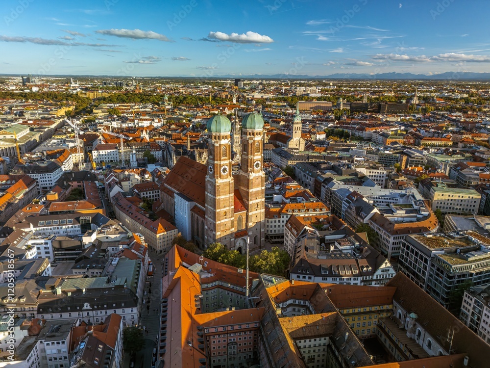 Fototapeta premium The drone aerial view of The Frauenkirche and downtown district of Munich, Germany. Munich Frauenkirche is one of the city's most famous landmarks.