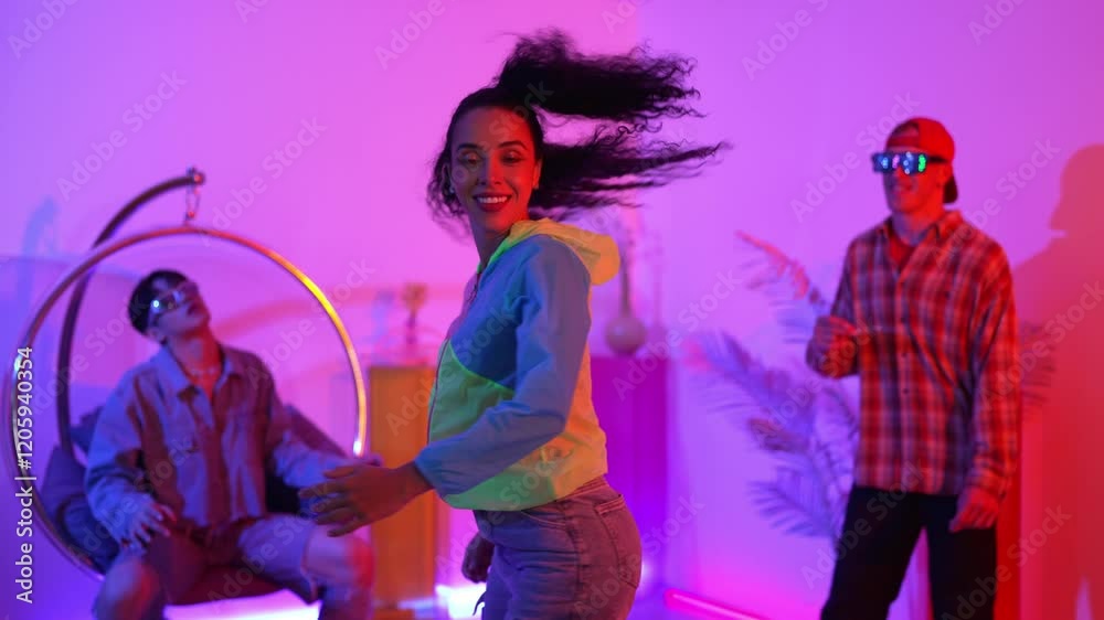 Hispanic hipster wear colorful cloth and waving to freestyle music. Professional break dancer moving to lively beat with neon light and led light with modern studio surrounded by friend. Regalement. Hispanic hipster wear colorful cloth and waving to freestyle music. Professional break dancer moving to lively beat with neon light and led light with modern studio surrounded by friend. Regalement.