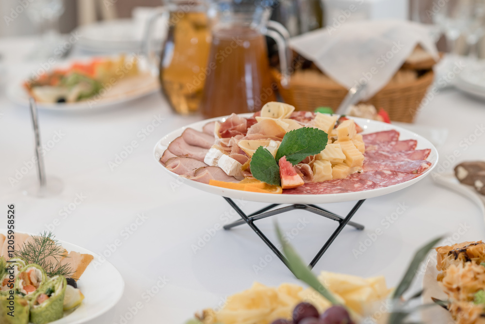 Wedding table with snacks, ham, crayfish and salads Wedding table with snacks, ham, crayfish and salads
