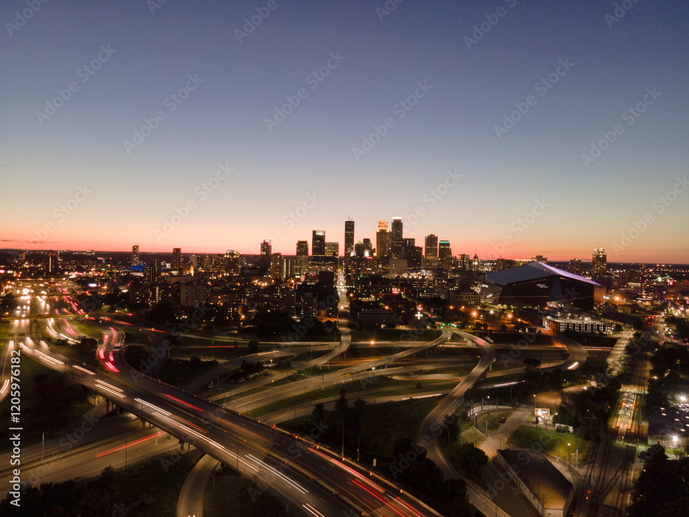 Minneapolis skyline at dusk with light trails Minneapolis skyline at dusk with light trails