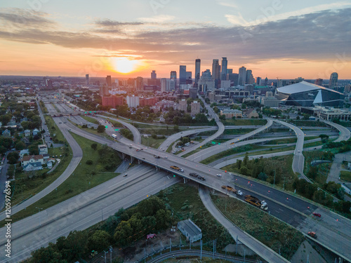 Aerial shot of downtown Minneapolis, Minnesota,  featuring highway interchange at sunset