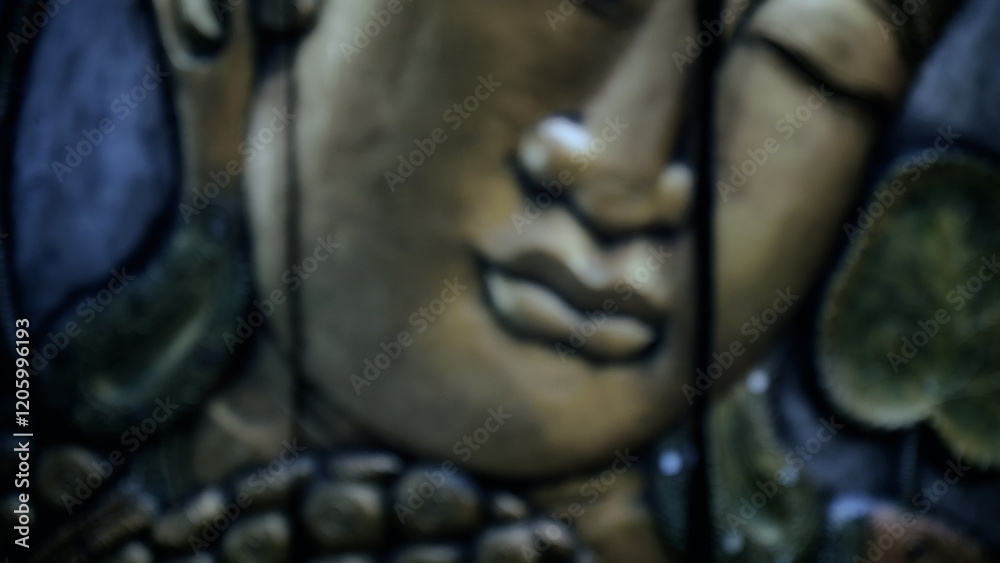 Blurred buddha face expressing serenity and peace