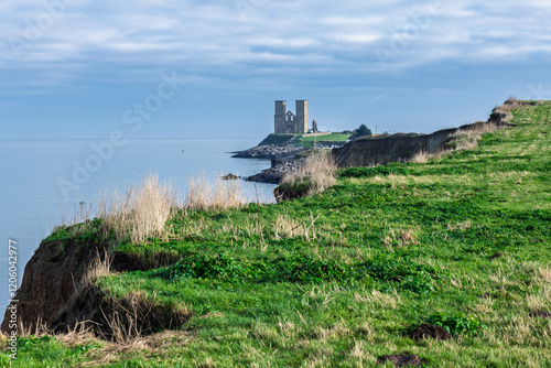 Reculver Towers near Herne Bay in Kent, England on a calm cold winters day photo