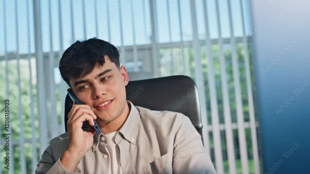 Smiling man speaking telephone feeling relaxed closeup. Businessman talking Smiling man speaking telephone feeling relaxed closeup. Businessman talking