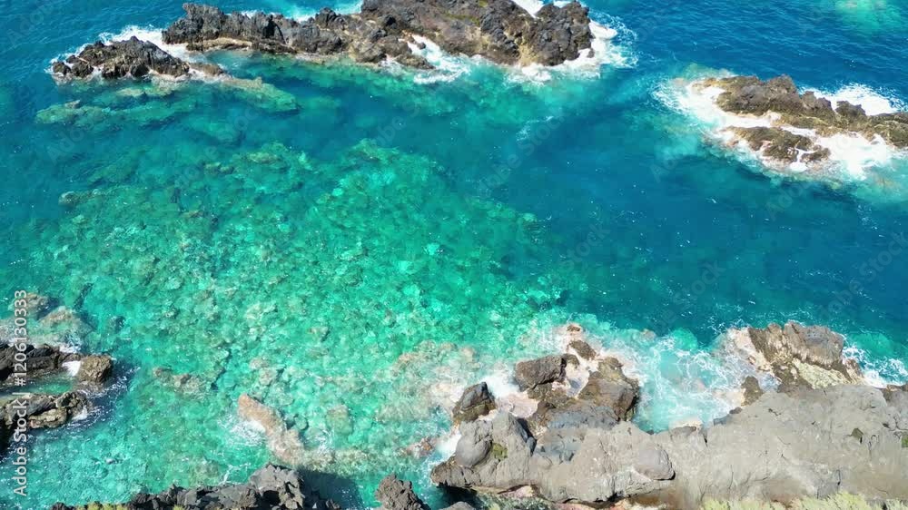Beautiful view of the ocean, waves, and rocks from above Beautiful view of the ocean, waves, and rocks from above