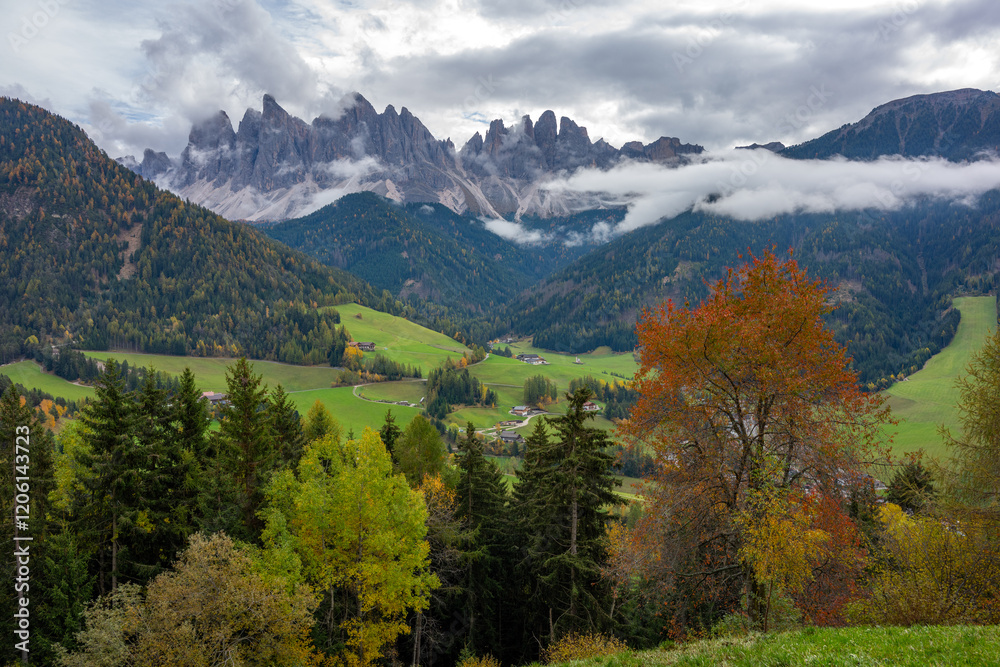 The specular landscape when you drive at Val di Funes area in Autumn season, Dolomite, Italy. The specular landscape when you drive at Val di Funes area in Autumn season, Dolomite, Italy.