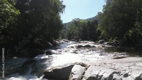river flowing though tropical landscape