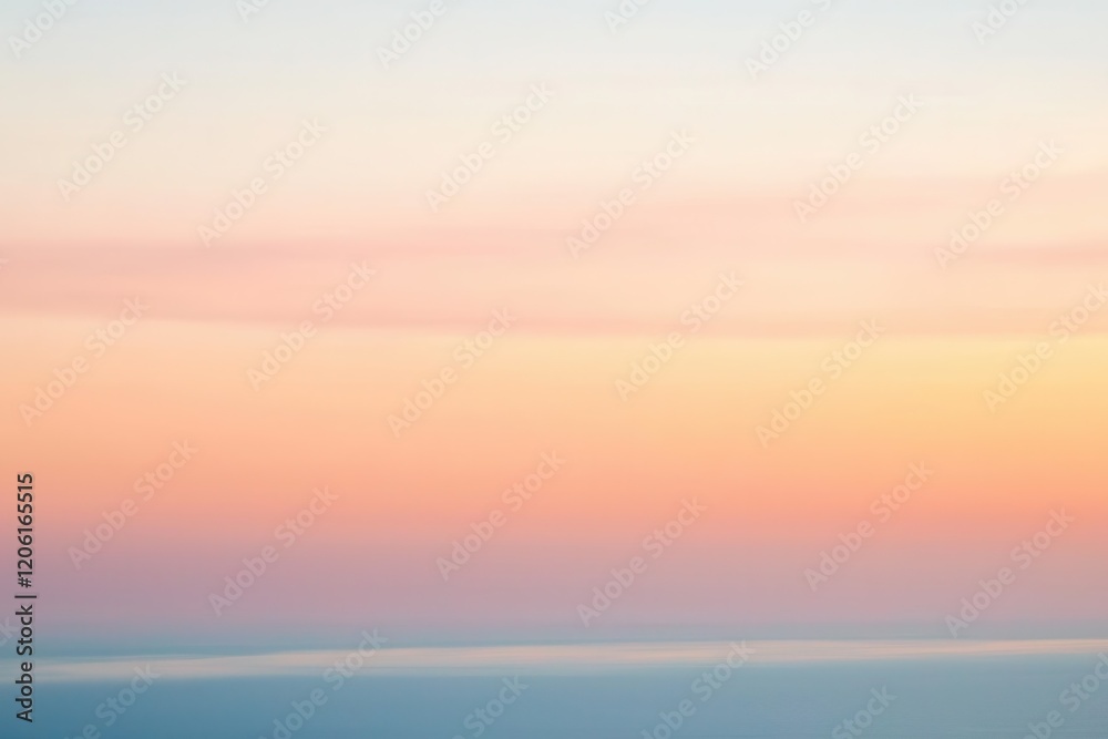 Fototapeta premium Sunset Gradient: A sky transitioning from deep orange to soft pink, with the horizon fading into a calm, dusky blue
