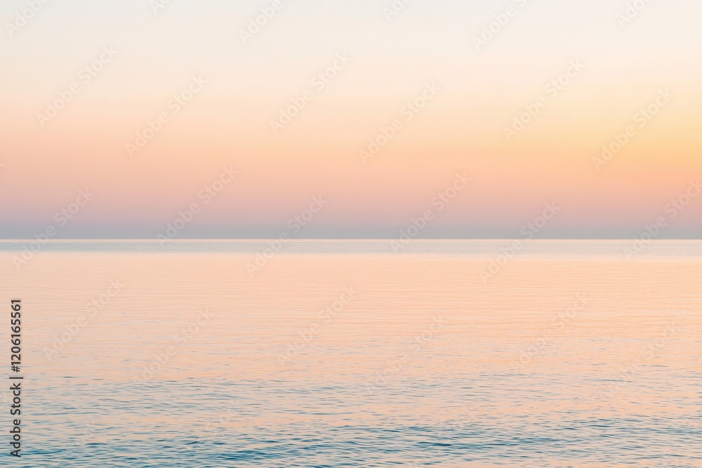 Fototapeta premium Sunset Gradient: A sky transitioning from deep orange to soft pink, with the horizon fading into a calm, dusky blue