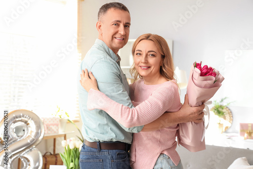 Middle-aged couple with bou...