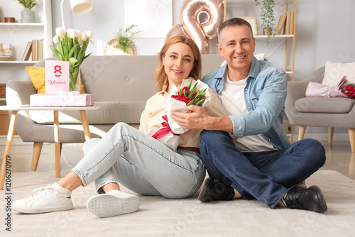 Middle-aged couple with bou...