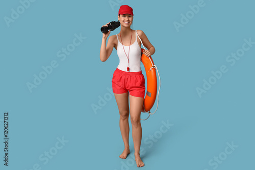 Female lifeguard with ring ...